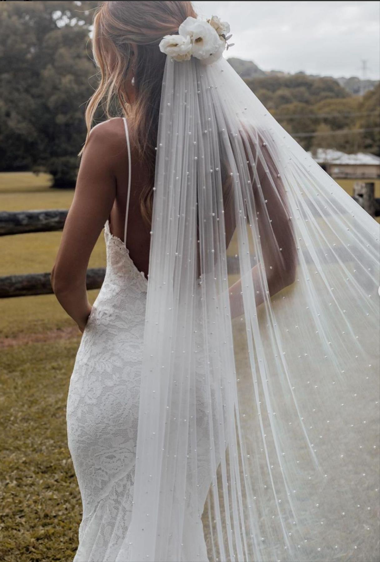 bridal hairstyles side ponytail with veil